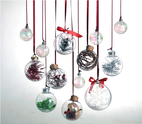 Fill these clear glass ornaments with tinsels, tiny berries and twigs, and moss.