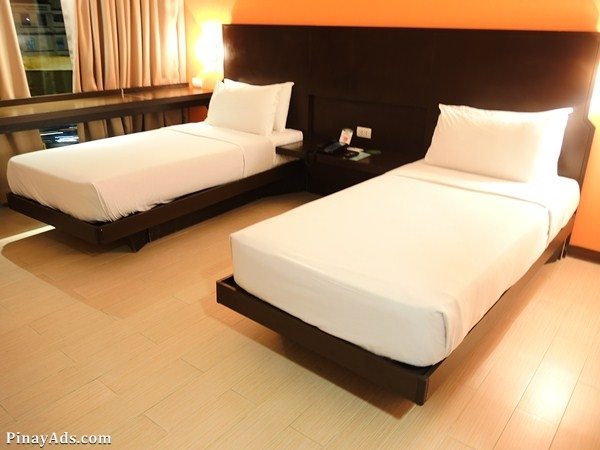 2 single beds for rooms that are specially adapted for PWDs