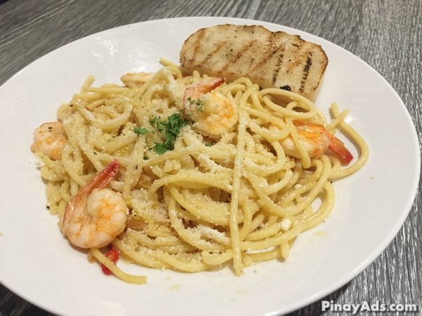 Pasta with sauteed garlic shrimp in spicy tomato sauce. PHP 195.00